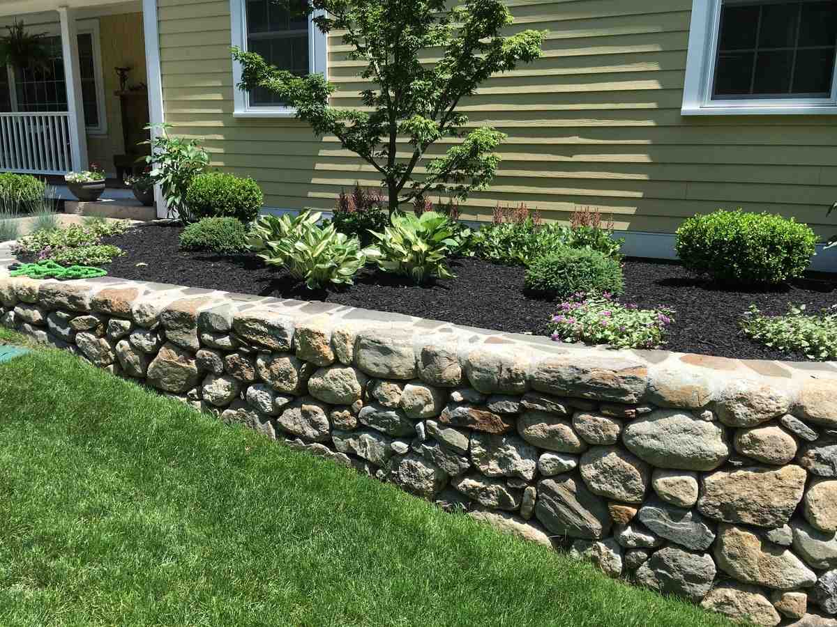 Decorative retaining wall bordering a garden - Andover retaining walls