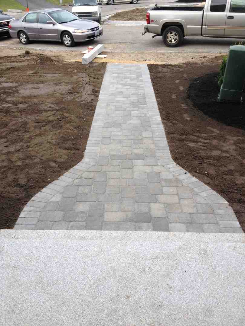 modern paver path installation - how much does it cost to have a walkway installed