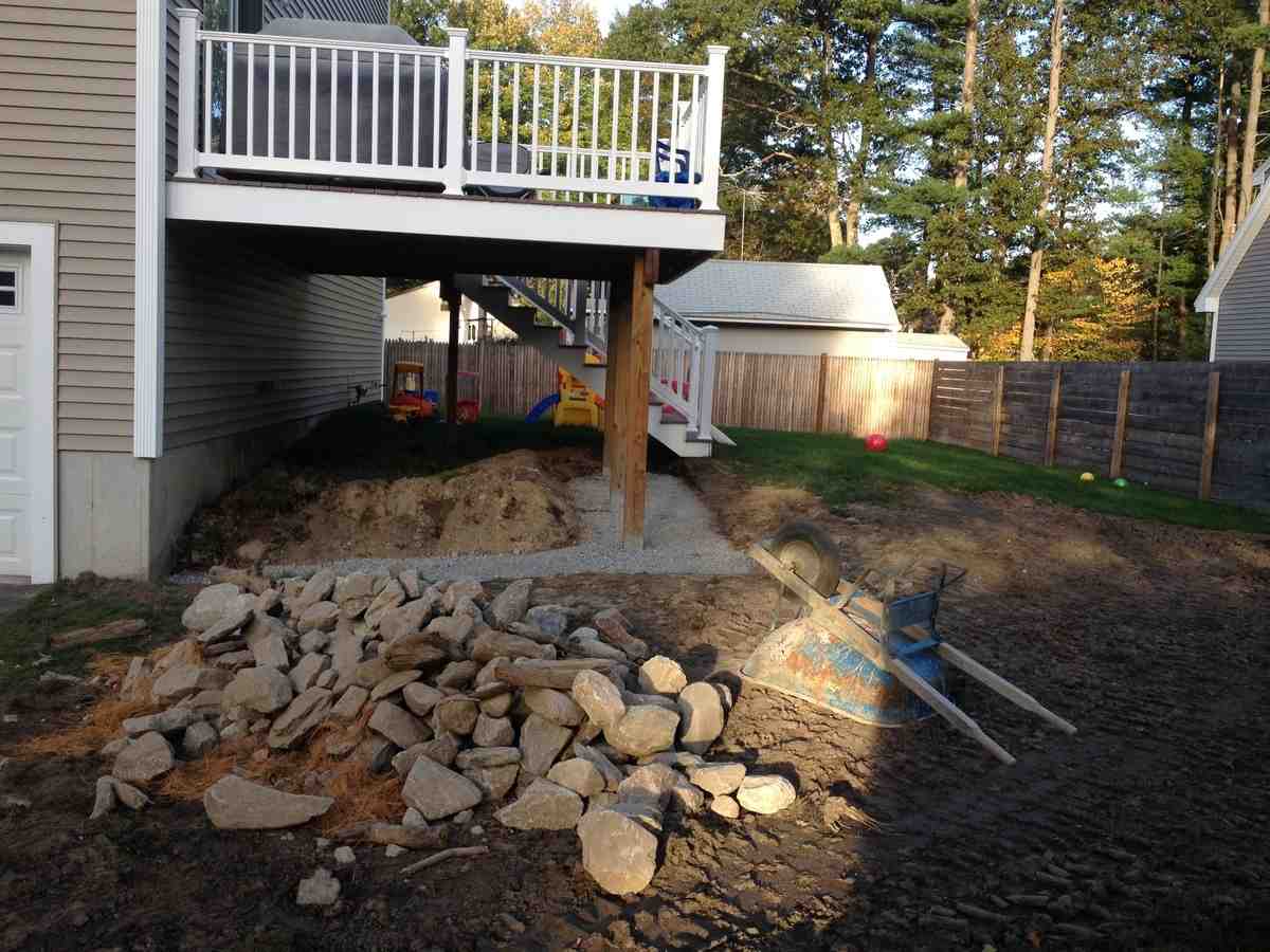 patio base preparation showing proper layering and compaction - Patio design Atkinson NH