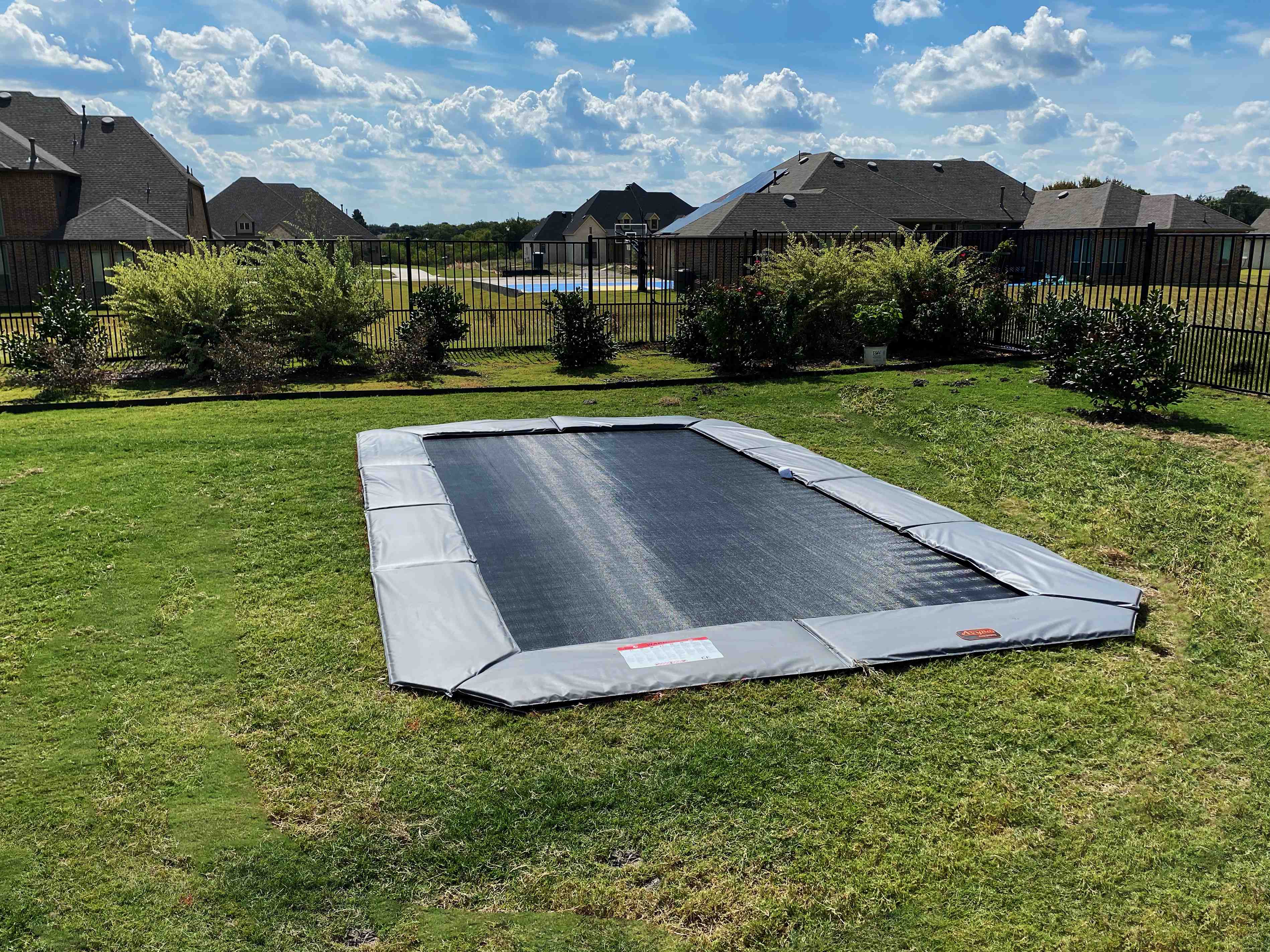 In-ground trampoline in a backyard - in ground trampoline near me