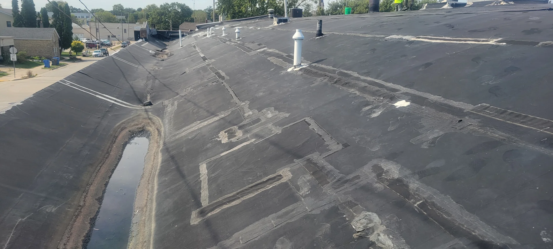 commercial flat roof inspection with drains, gravel, and flashing checks commercial flat roof inspection with drains, gravel, and flashing checks
