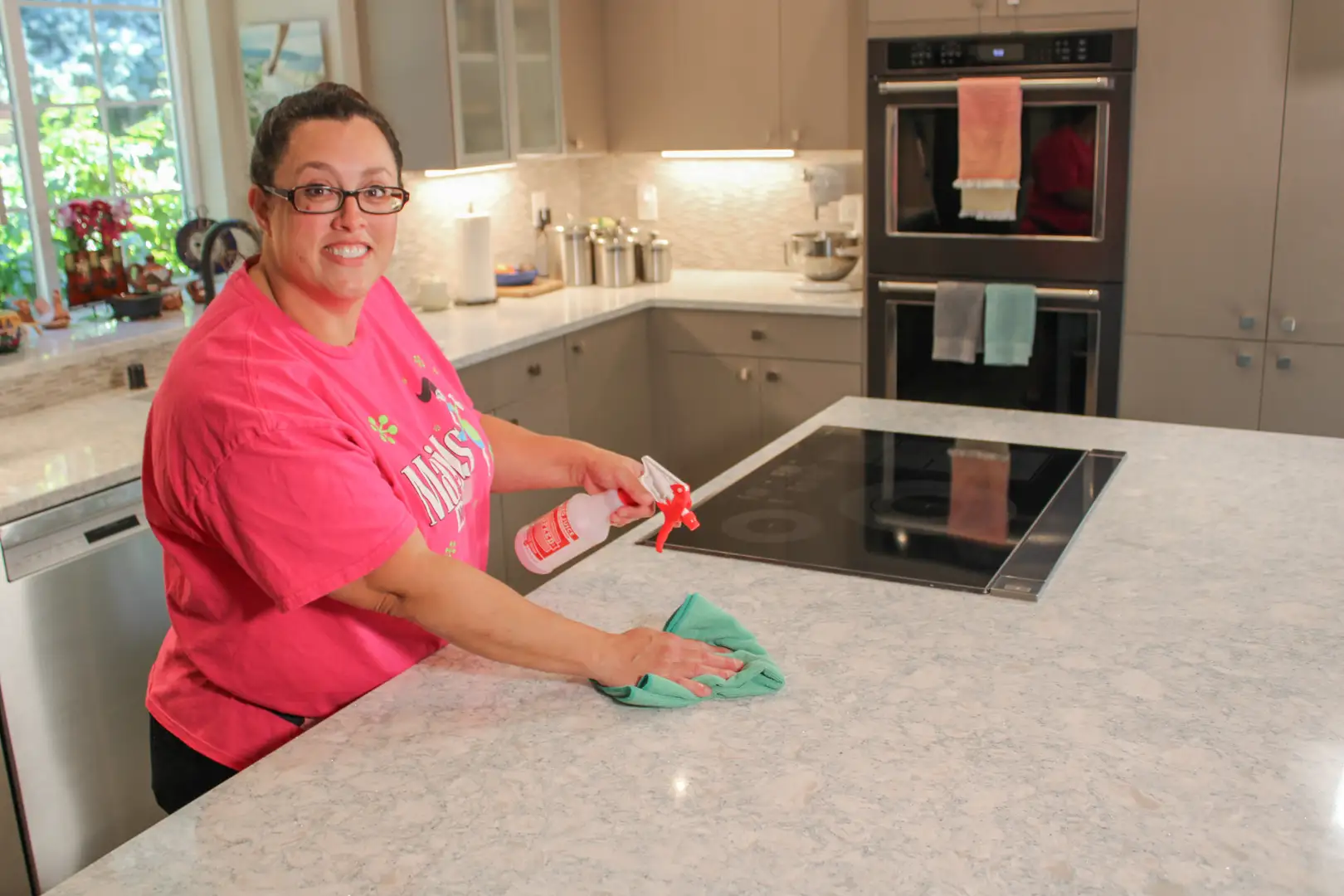 Eco-friendly cleaning supplies like vinegar, baking soda, and microfiber cloths arranged on a wooden table - deep cleaning Eco-friendly cleaning supplies like vinegar, baking soda, and microfiber cloths arranged on a wooden table - deep cleaning
