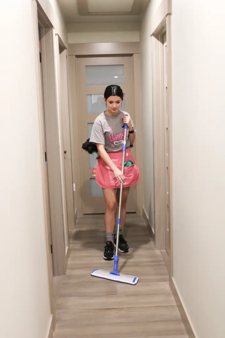 Microfiber mop and eco-friendly wood cleaner on a light hardwood floor - best way to maintain hardwood floors Microfiber mop and eco-friendly wood cleaner on a light hardwood floor - best way to maintain hardwood floors