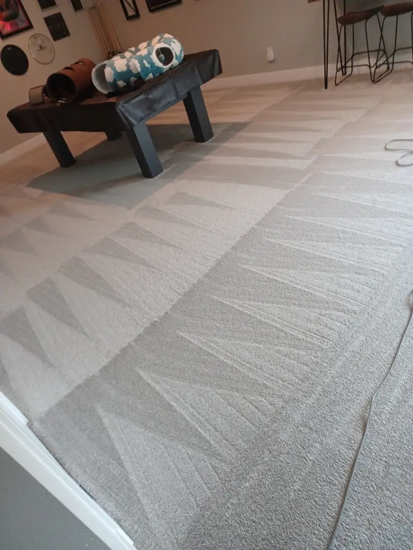 A family relaxing on a clean rug in a tidy living room, free from the stress of weekend chores - why regular cleaning is A family relaxing on a clean rug in a tidy living room, free from the stress of weekend chores - why regular cleaning is