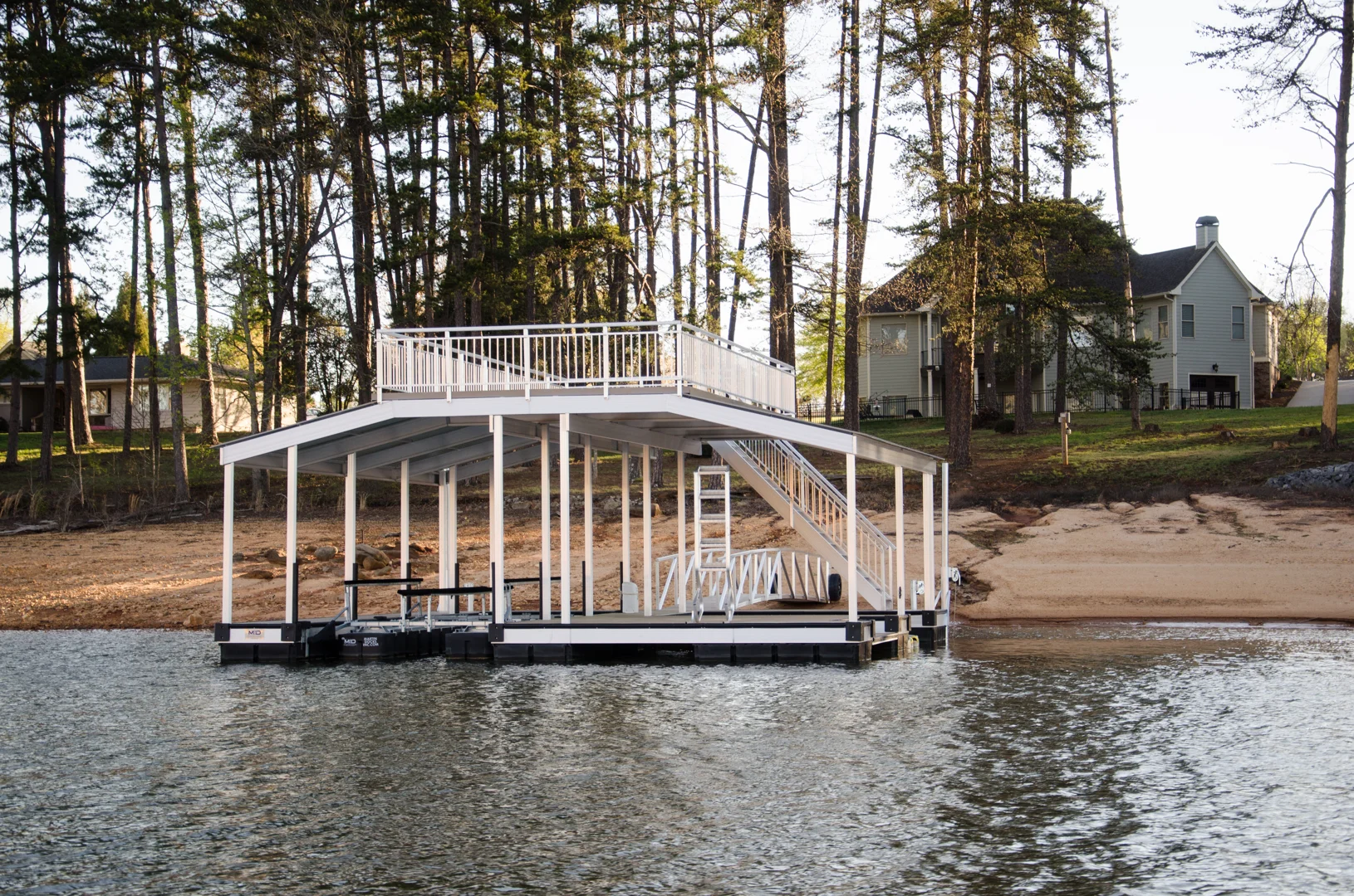 Modern floating aluminum dock with a sundeck on Lake Chatuge Modern floating aluminum dock with a sundeck on Lake Chatuge