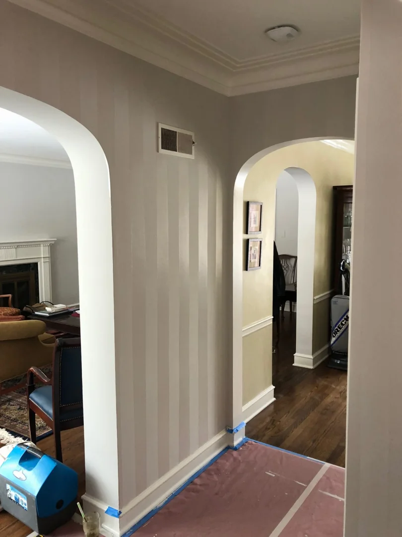 Sealed doorway with HEPA air scrubber during bathroom demolition