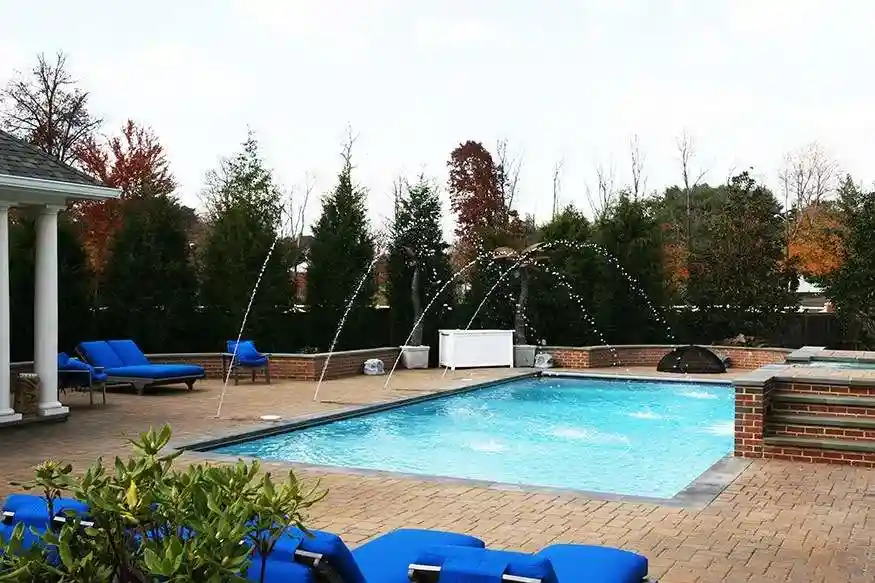luxury pool with spa and waterfall - how to remodel a pool