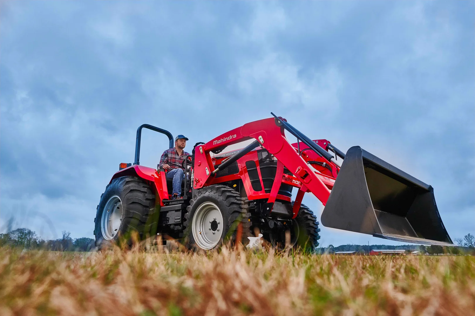 Tractor tire pressure inspection on rural Virginia terrain