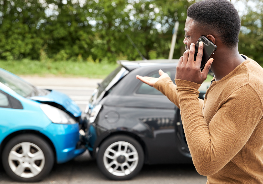 Car accident scene with one modern, expensive car and one older car, illustrating the high cost of potential damages. - minimum coverage for car insurance