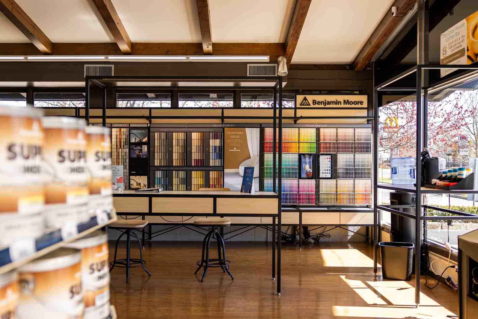 Interior of a local Benjamin Moore paint store showing organized displays and color chips - benjamin moore paint store rhode