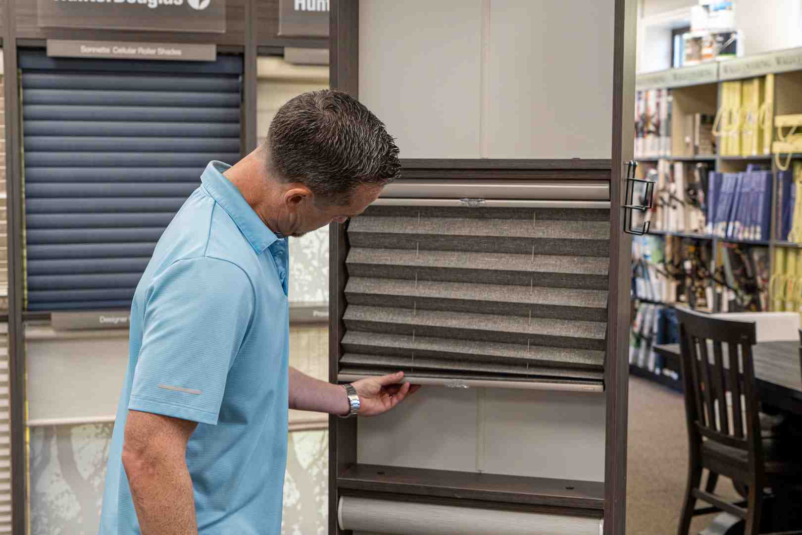 professional installer measuring a window - Why hire a professional?