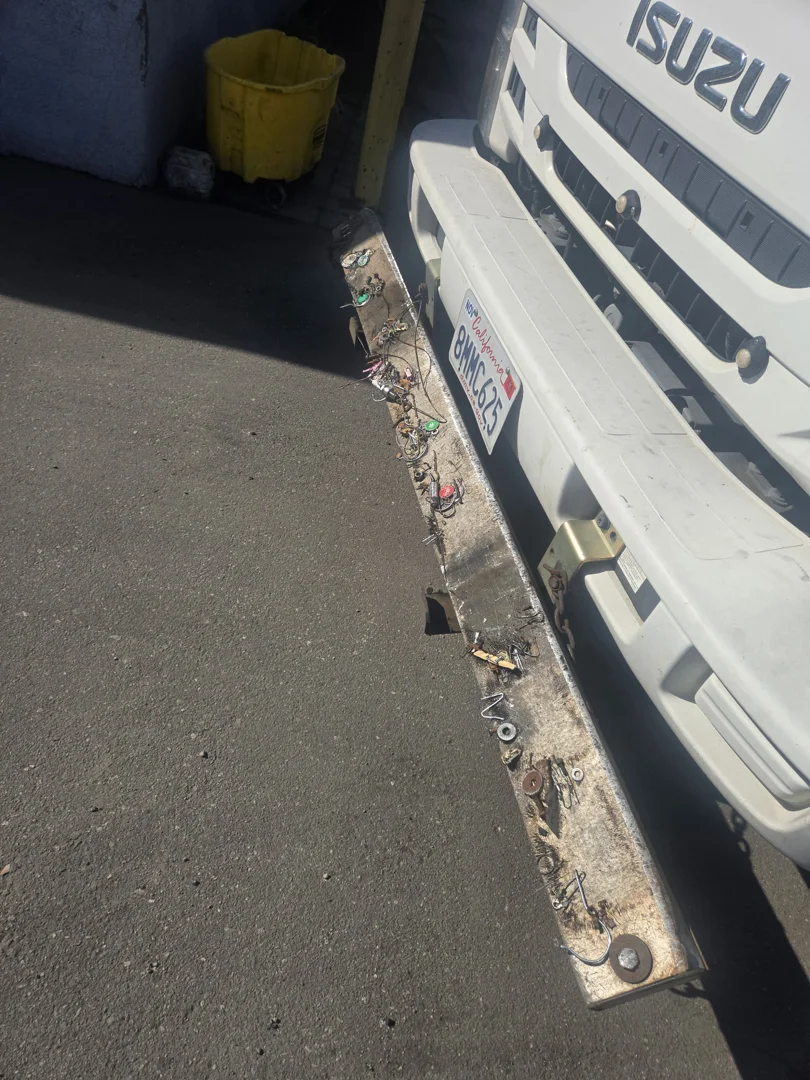 Professional sweeping truck operating in a commercial parking lot in Torrance Professional sweeping truck operating in a commercial parking lot in Torrance