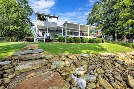 Lakefront home with a secure fenced yard for dogs
