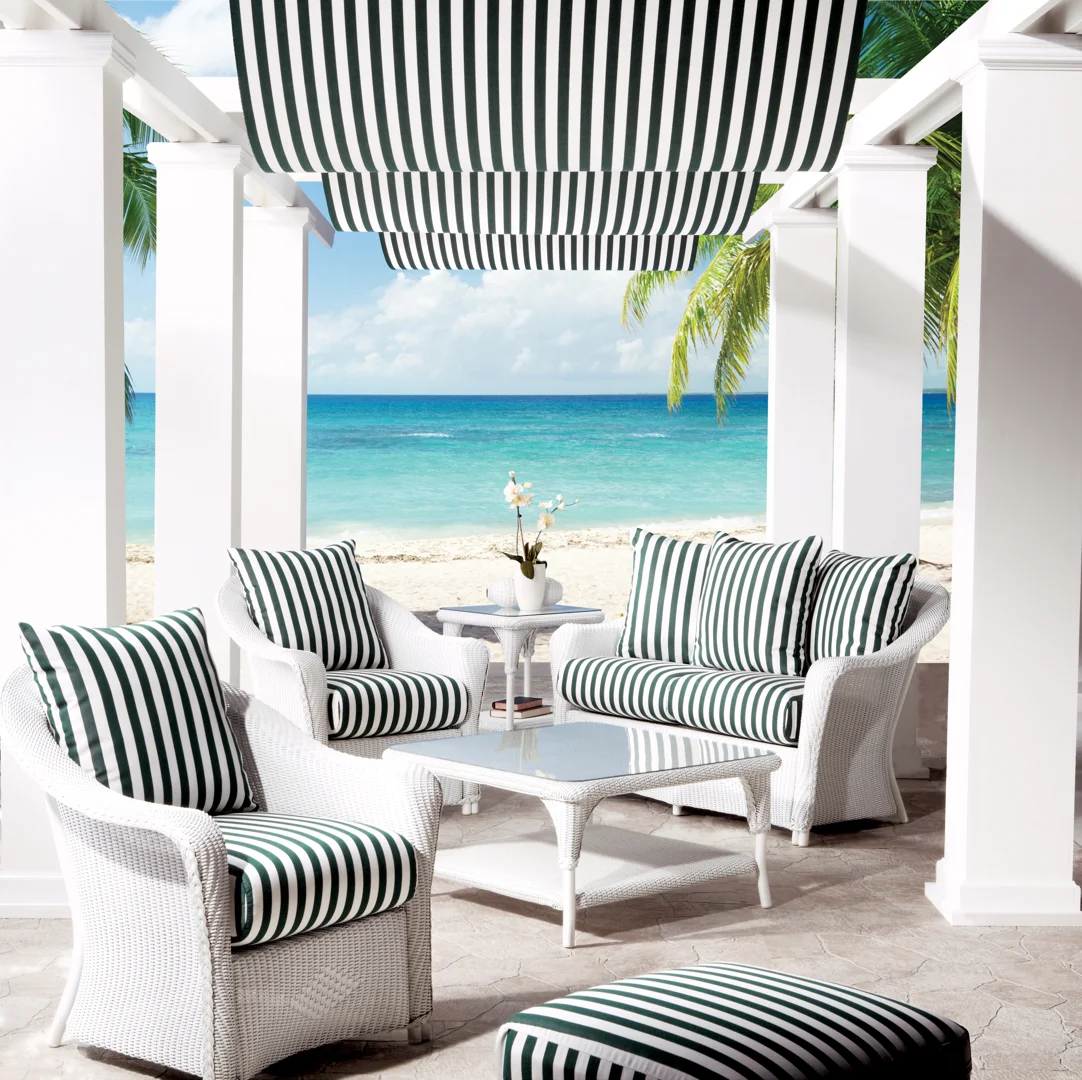 Reflections Swivel Glider Lounge Chair in a custom parchment finish - lloyd flanders chairs