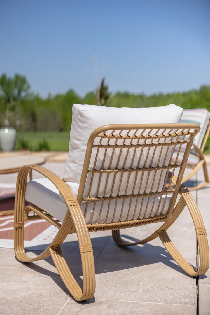 All Seasons wicker set on a sunny deck All Seasons wicker set on a sunny deck