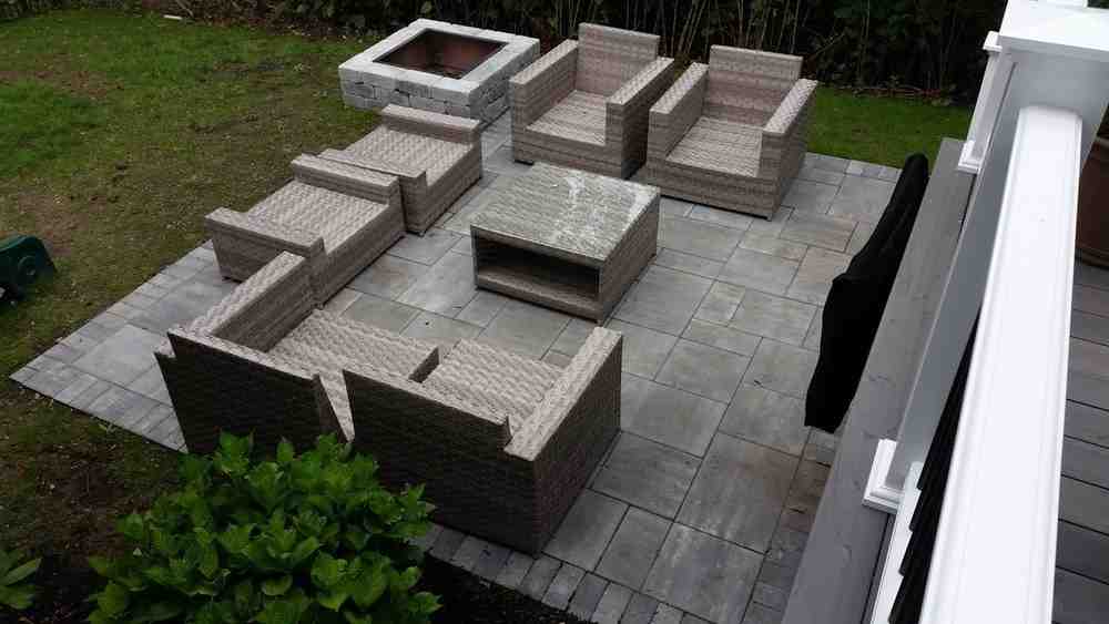luxury stone fire pit integrated into patio design - fire pit for backyard
