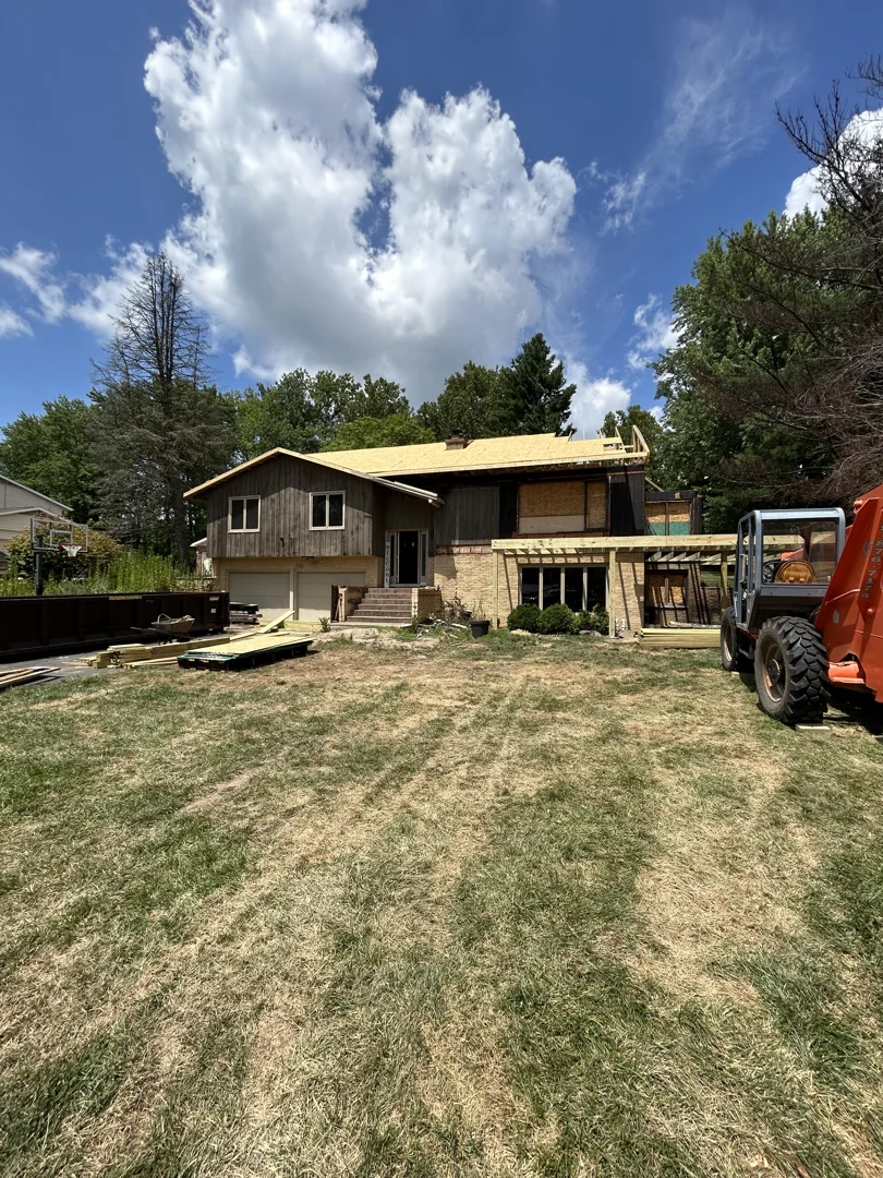 A custom home renovation in progress showing professional sequencing - exterior home renovations