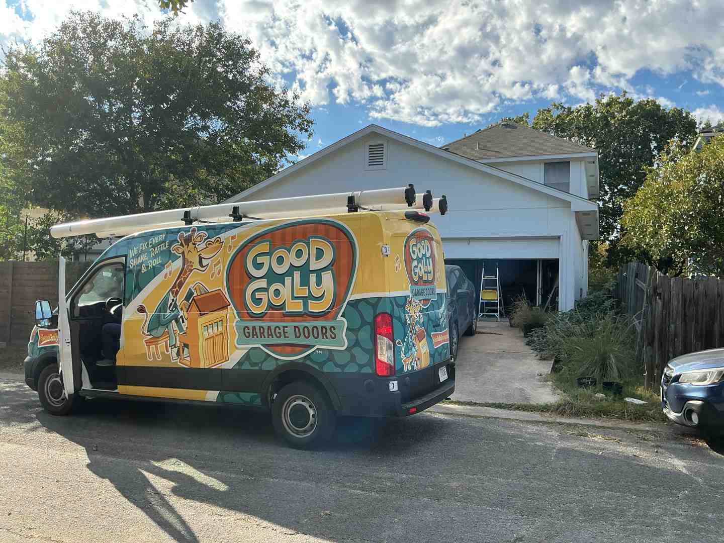 friendly, professional technician speaking with a homeowner - Best Garage Door Maintenance in Liberty Hill TX