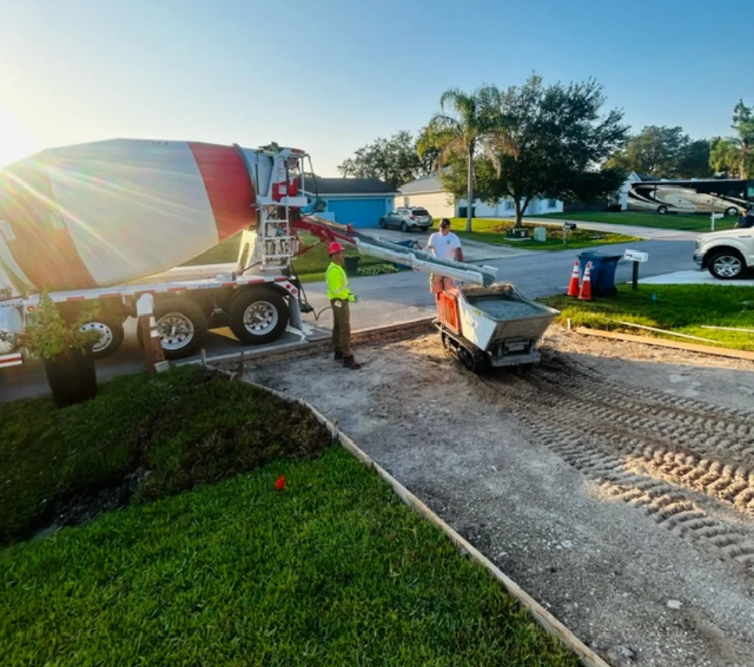 pouring high strength 5000 PSI concrete for a residential driveway pouring high strength 5000 PSI concrete for a residential driveway