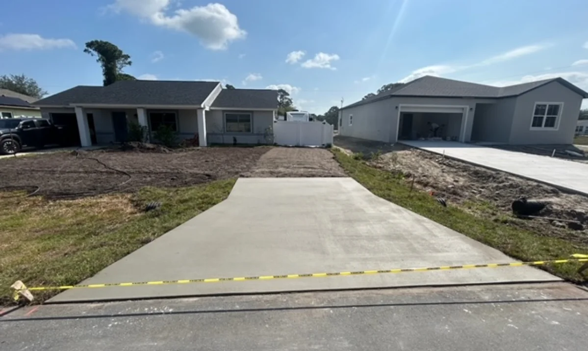 Durable finished concrete pad for a backyard shed Durable finished concrete pad for a backyard shed