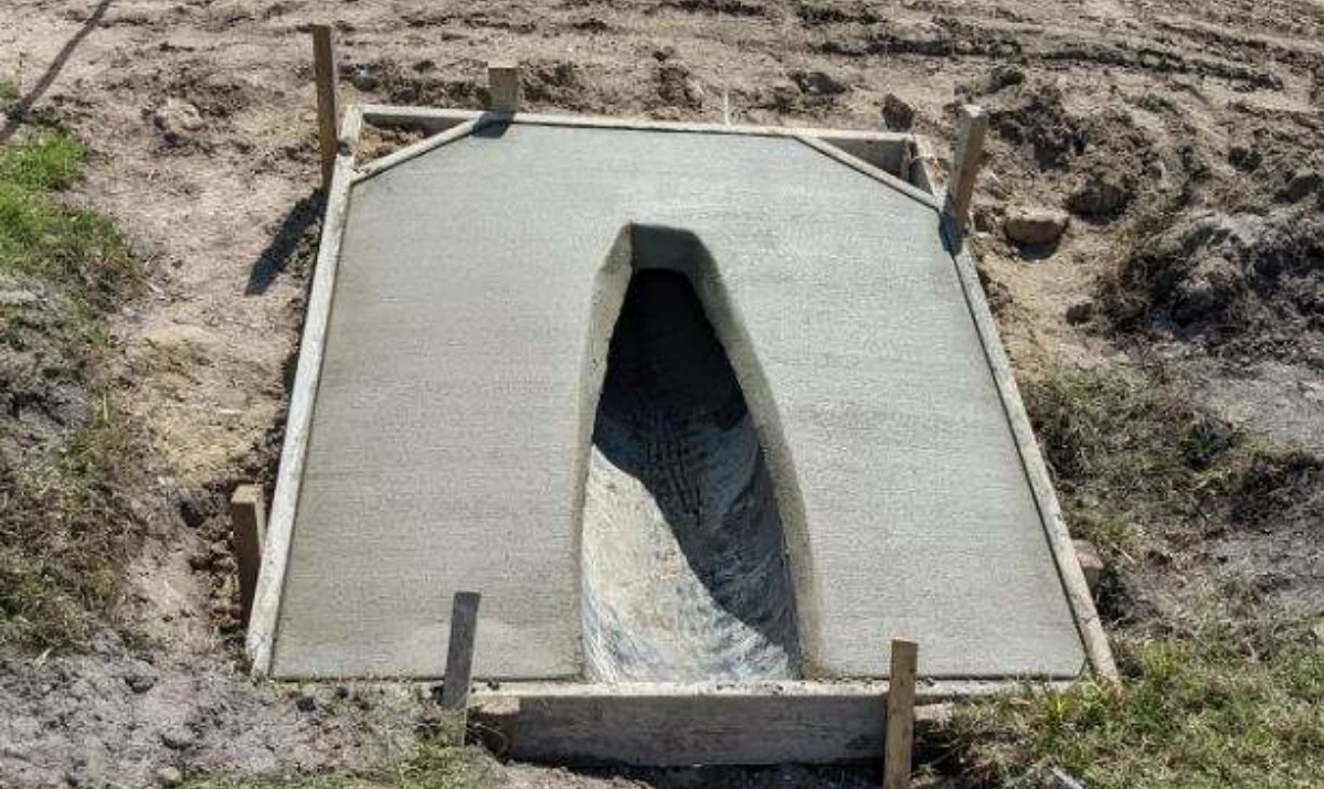 Residential concrete patio with integrated drainage system in Brevard County