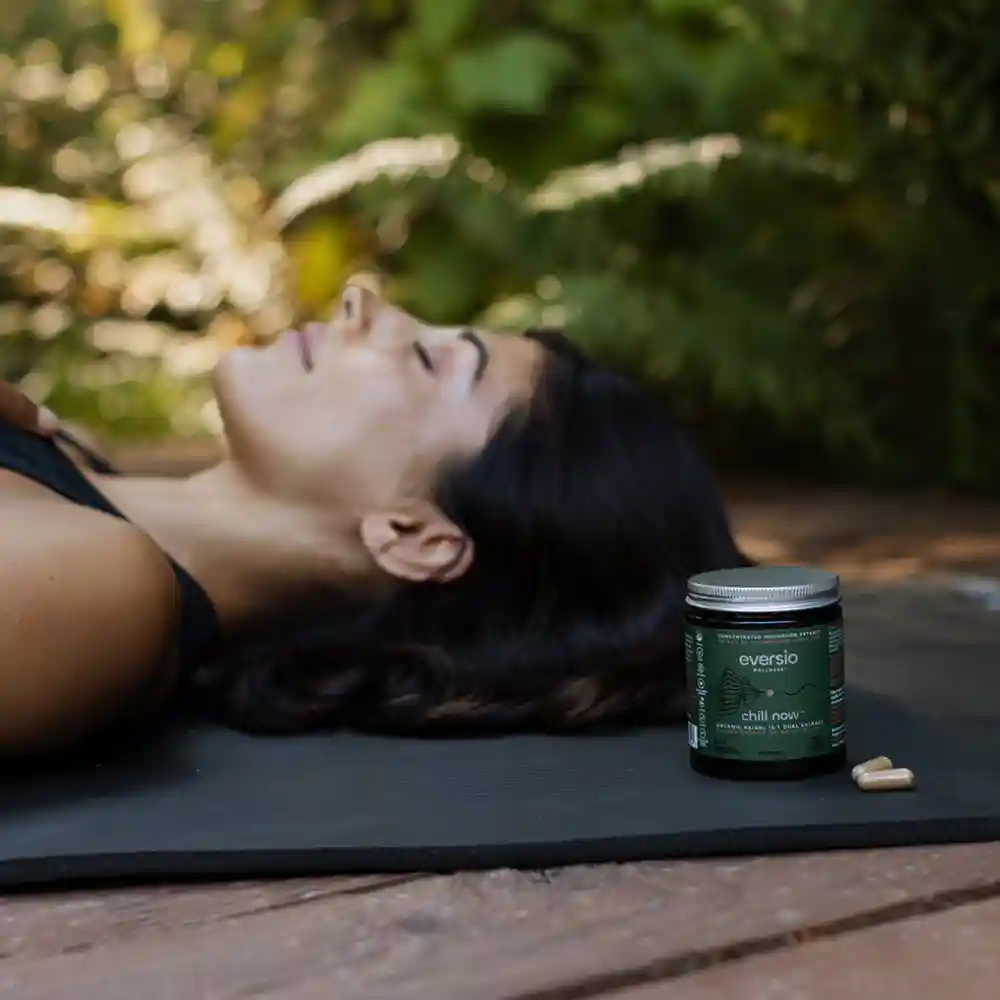 A health-conscious person comparing reishi mushroom supplements by reading the ingredients label. - Reishi Mushroom Supplements