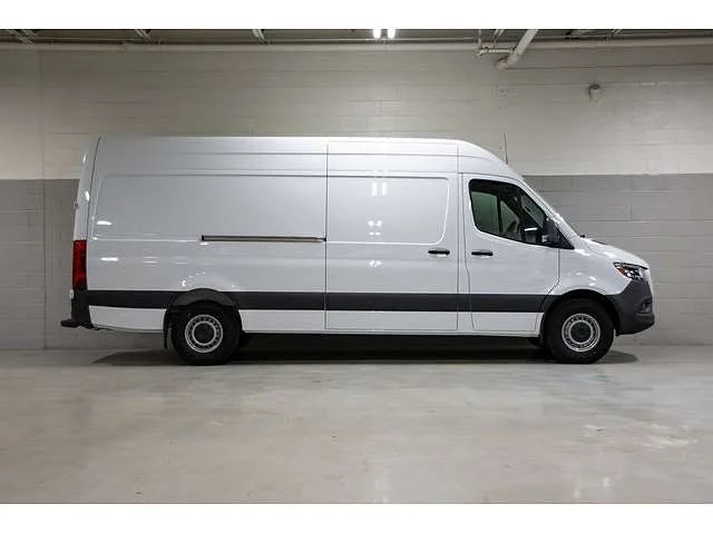 A professional white courier van ready for a same-day delivery mission A professional white courier van ready for a same-day delivery mission