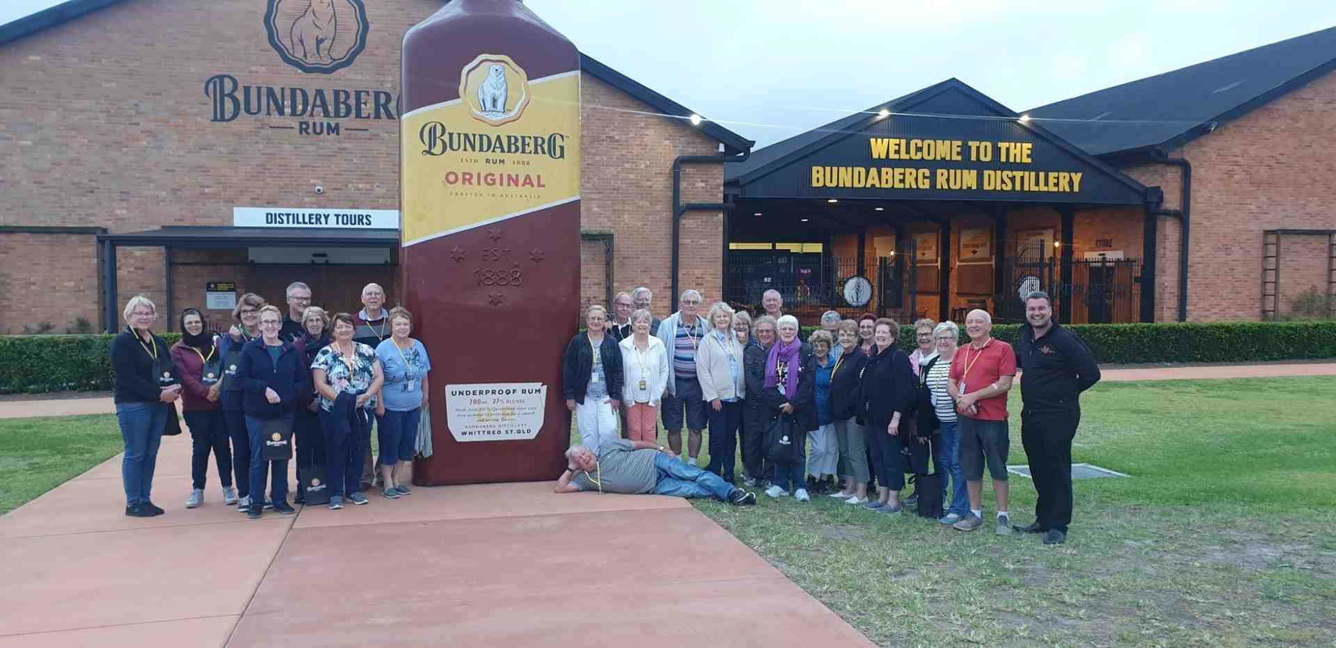 Seniors enjoying a guided winery tour near Mt Tamborine, arriving by Brisbane360 mini coach. - senior group travel