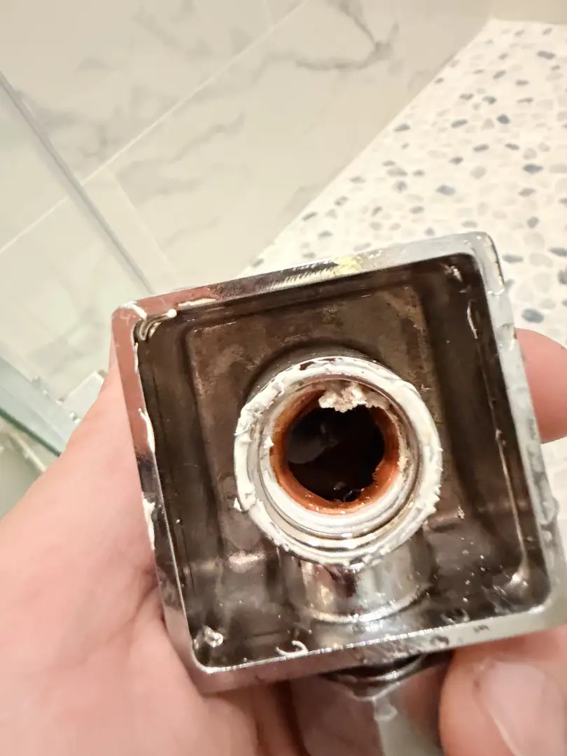 mineral buildup on a bathroom fixture mineral buildup on a bathroom fixture