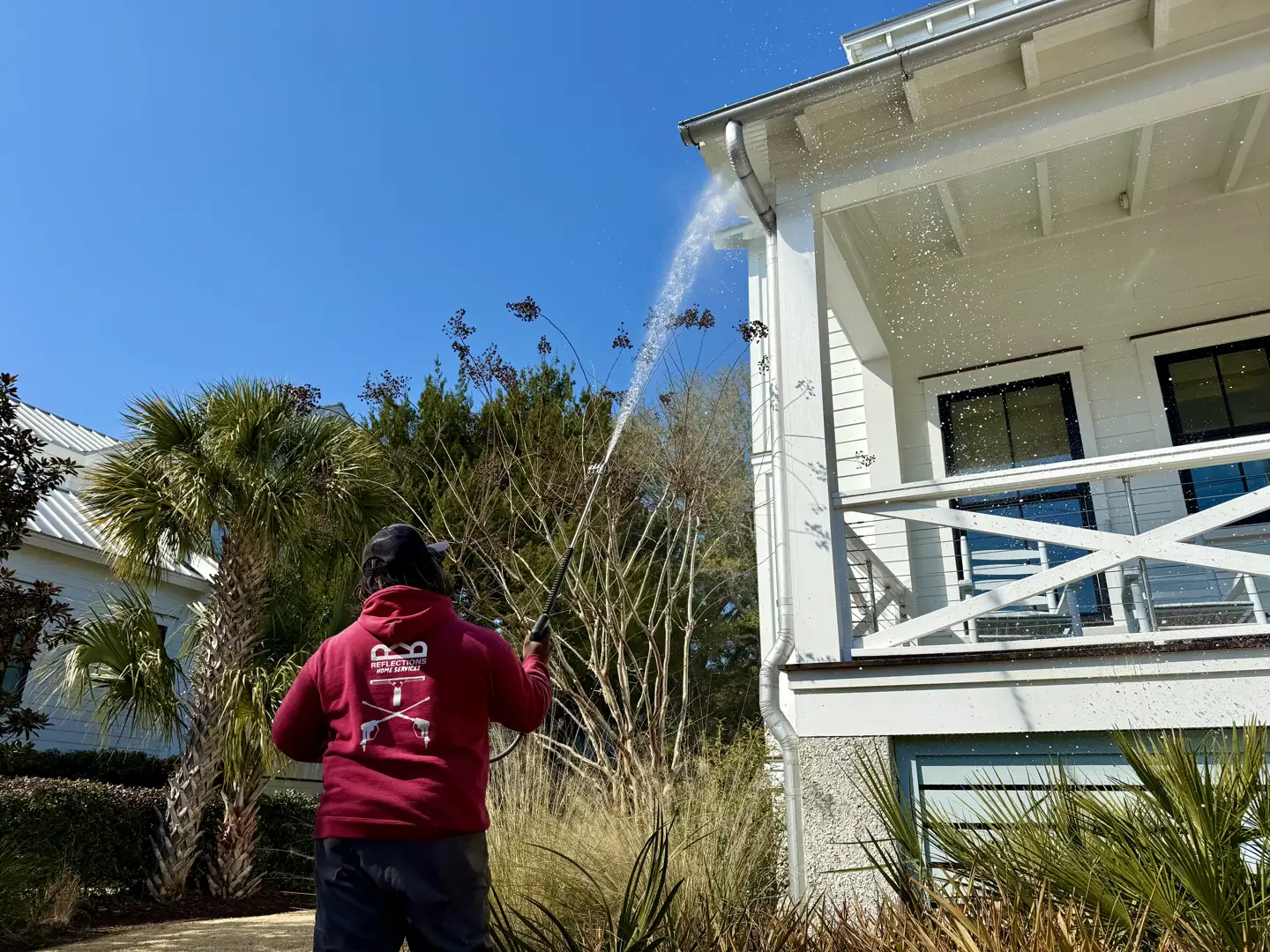Soft wash application being performed on a luxury Lowcountry home - pressure washing mount pleasant sc Soft wash application being performed on a luxury Lowcountry home - pressure washing mount pleasant sc
