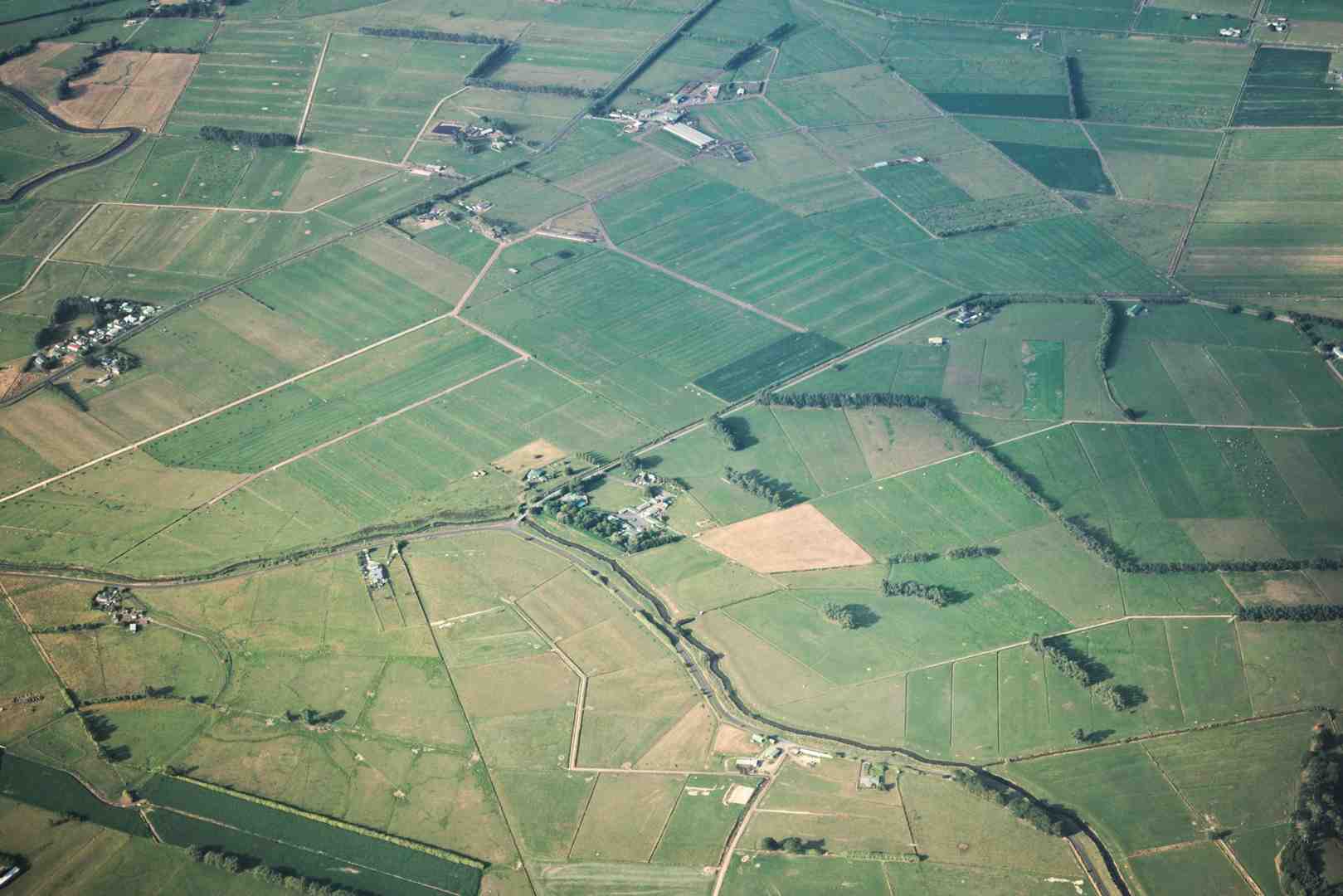 Aerial view of agricultural land with visible property boundaries and access roads - what to look for when buying agricultural land