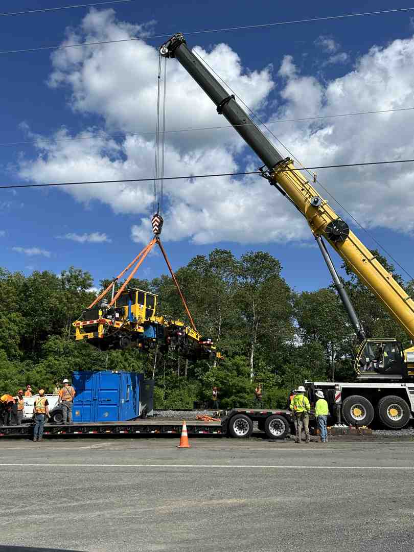 tracked crane performing a pick-and-carry operation
