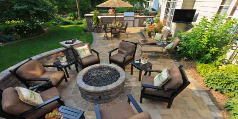 integrated hardscape and softscape design with paver patio and plantings - hardscape contractor
