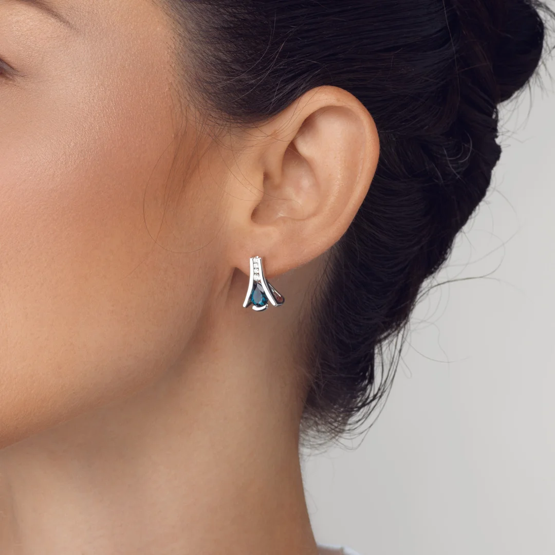 amethyst stud earrings with fine metal detailing