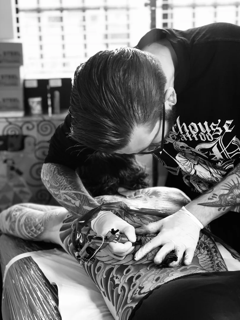 Background shading being applied to a large Japanese sleeve Background shading being applied to a large Japanese sleeve