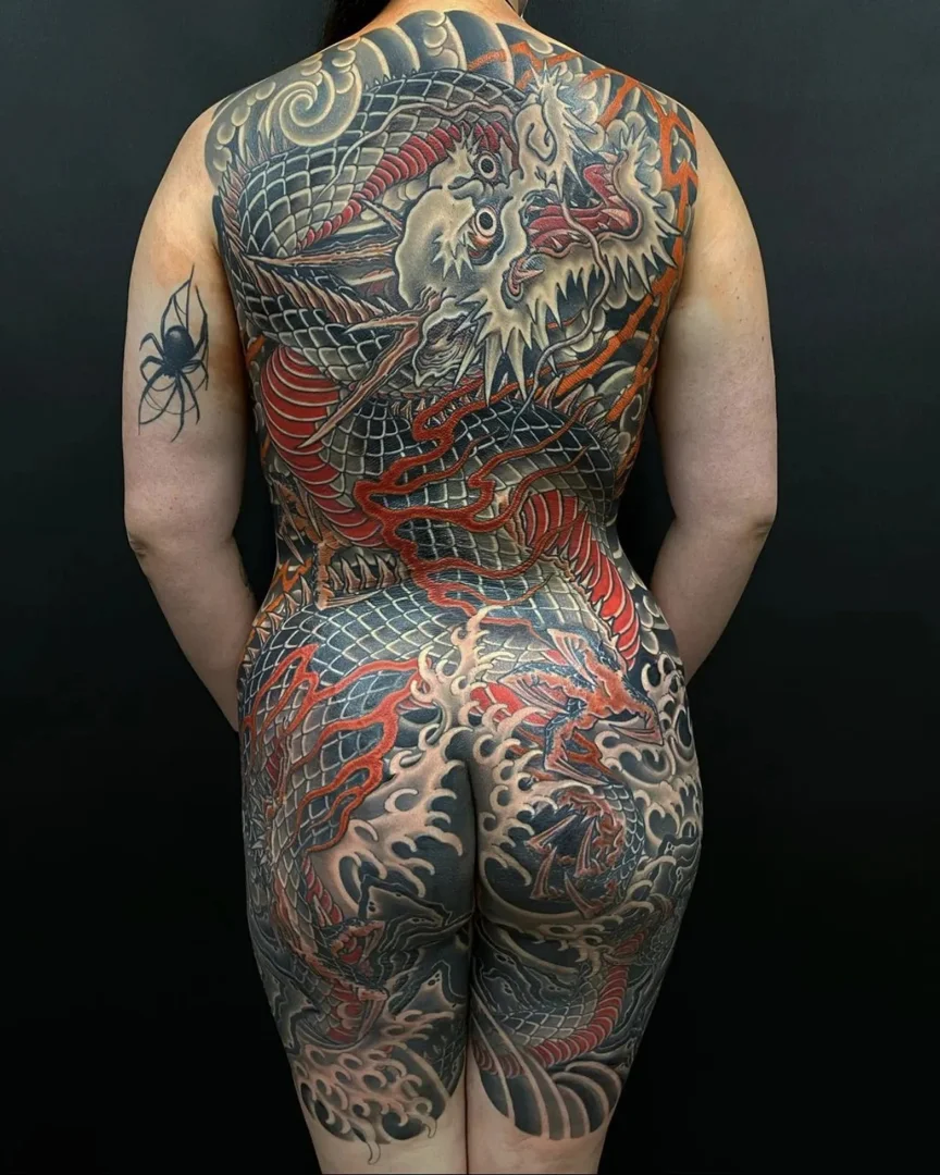 Japanese back tattoo with large-scale composition and background shading
