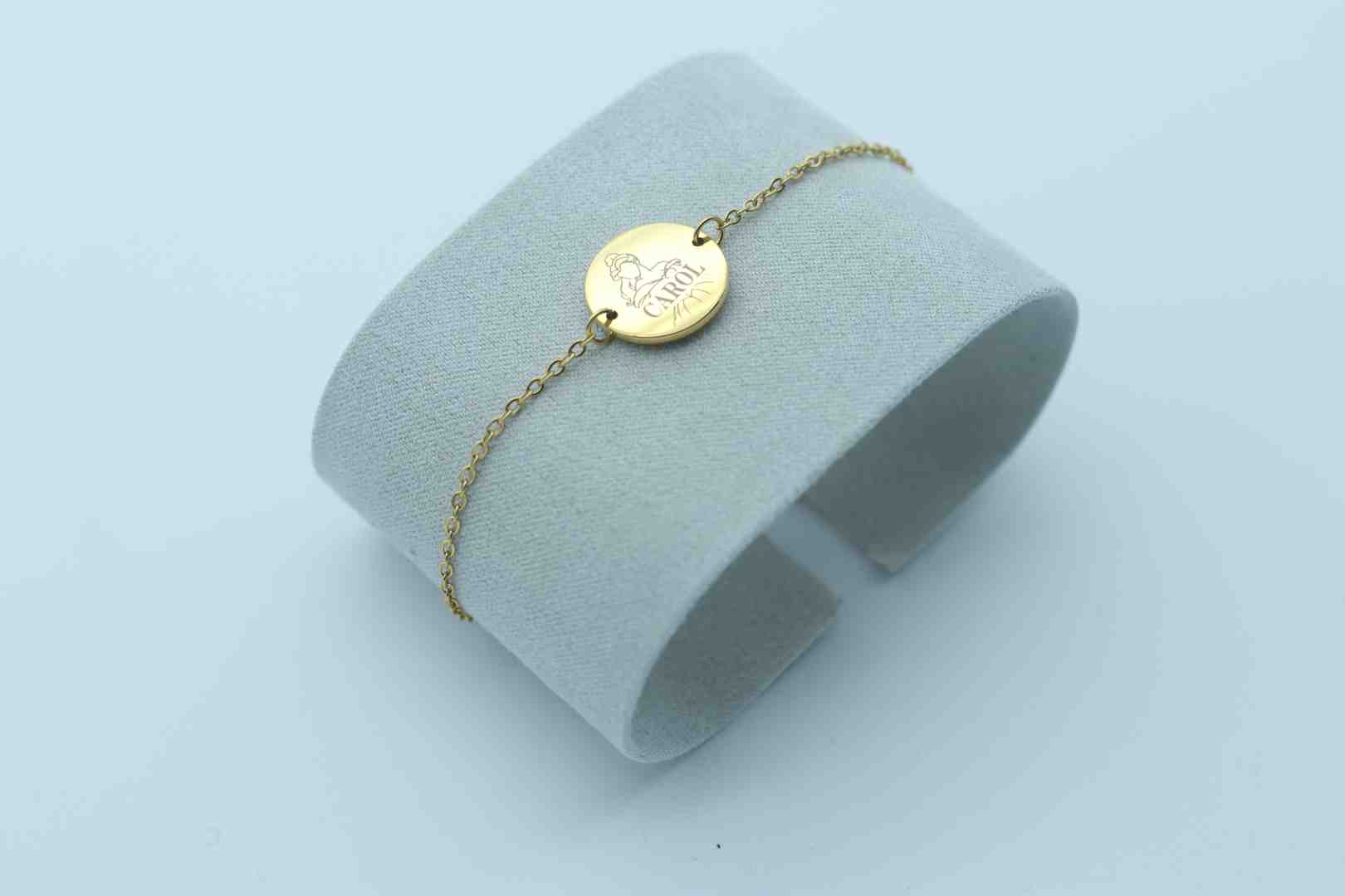 close-up shot showing detailed engraving on a bracelet - personalised necklace and bracelet set