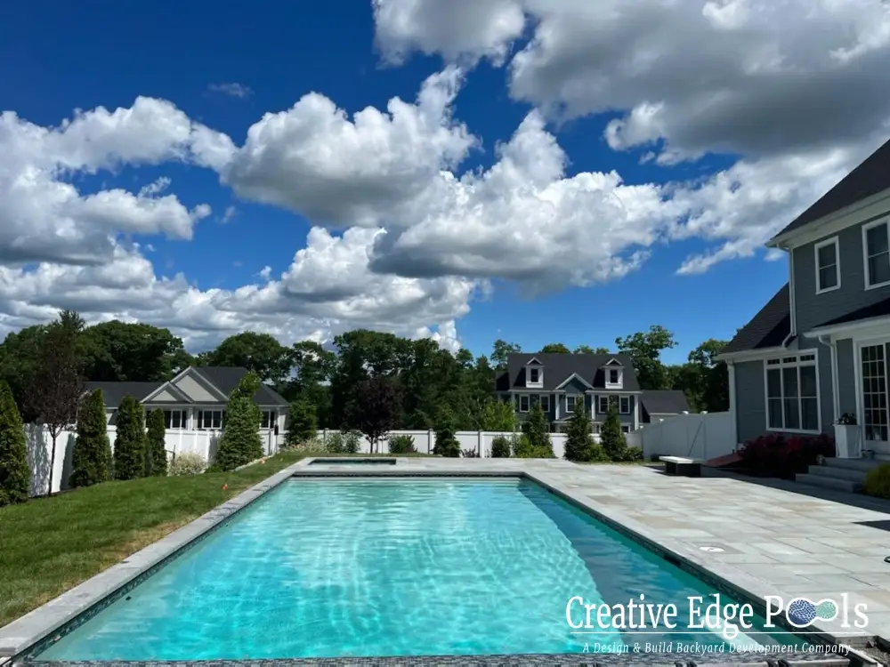 modern rectangular gunite pool with clean line patio