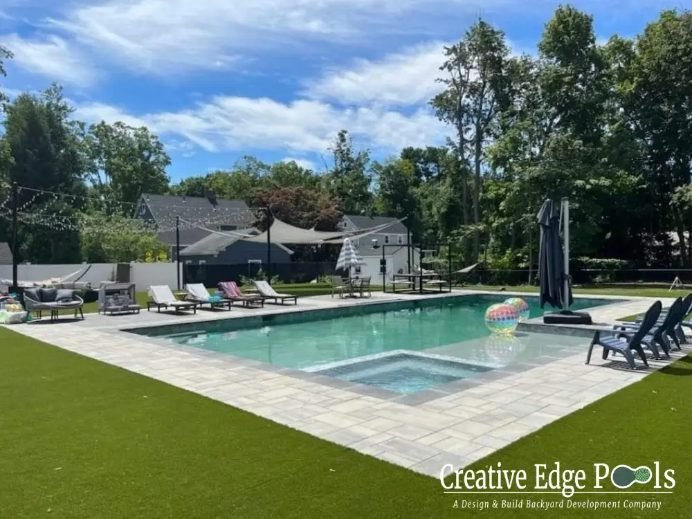 compact plunge pool with integrated spa seating in small backyard compact plunge pool with integrated spa seating in small backyard