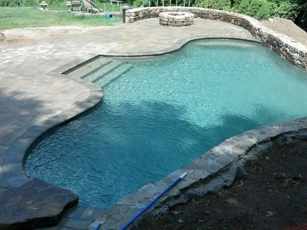 Modern fire bowl poolside design - Poolside fire pit