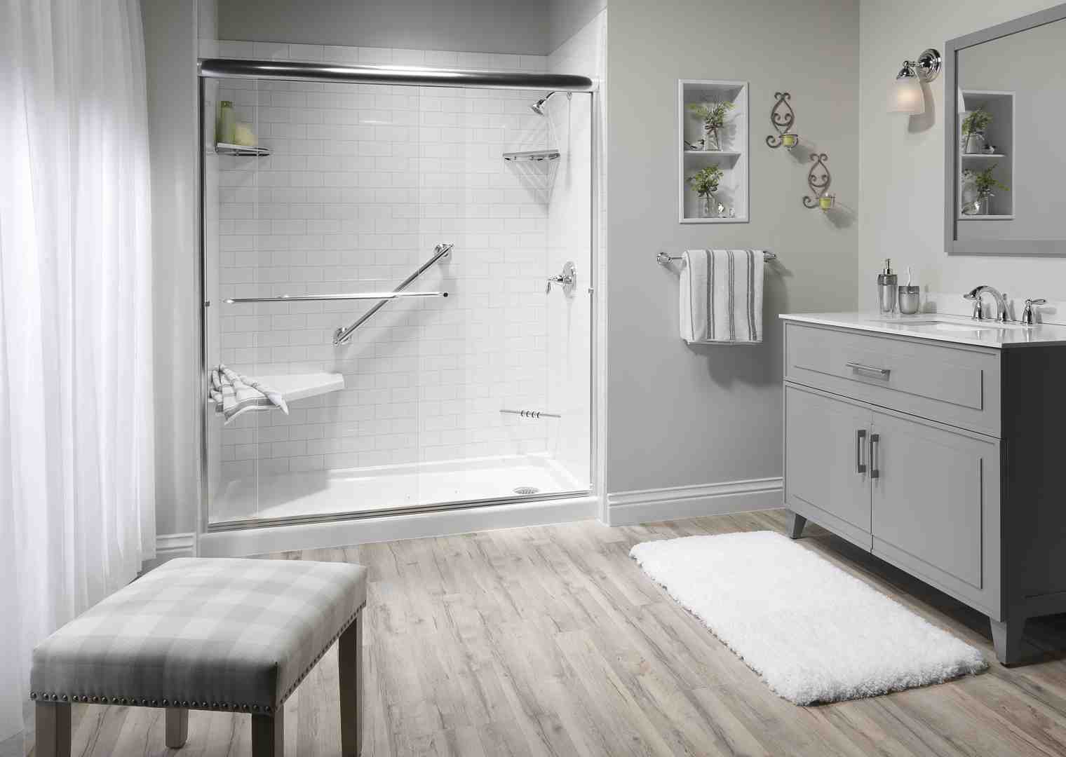 Glass-enclosed walk-in shower with light-colored tiles - walk-in shower