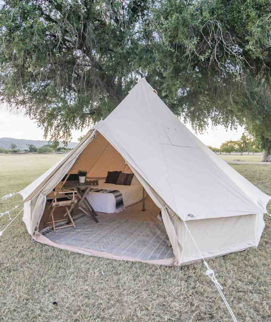 interior of a spacious, well-lit bell tent - glamping equipment
