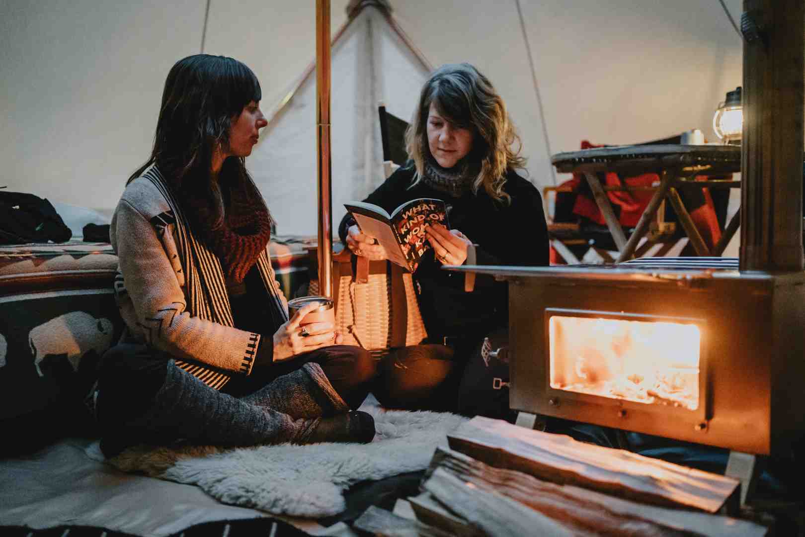 Interior of a canvas bell tent, looking warm and inviting with winter gear inside - are 4 season tents warmer