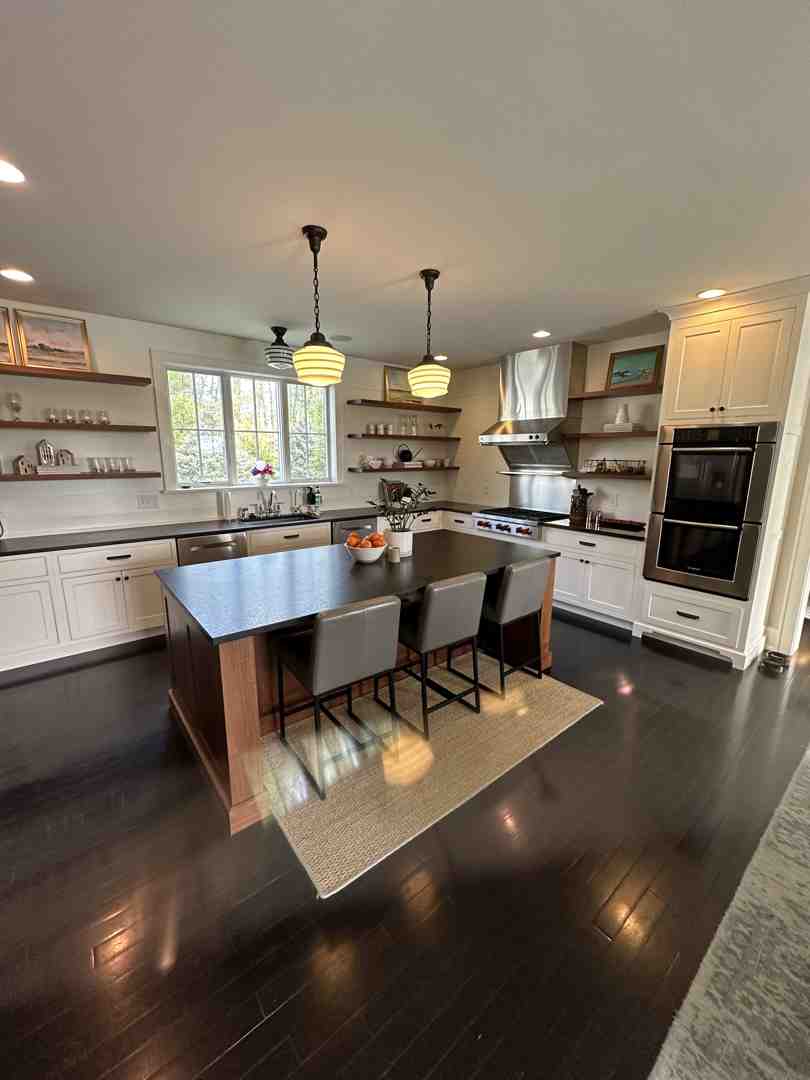 A modern kitchen seamlessly integrated into a historic Columbus home with custom cabinets and historic trim A modern kitchen seamlessly integrated into a historic Columbus home with custom cabinets and historic trim