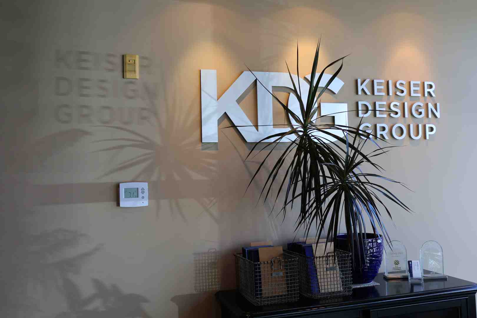 A business owner welcoming a customer into a vibrant, well-organized retail space with intuitive flow - commercial