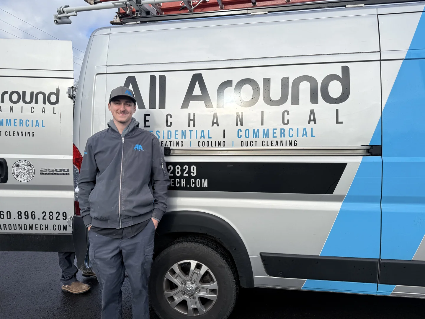 An HVAC technician arriving at a home in Ridgefield WA with diagnostic tools An HVAC technician arriving at a home in Ridgefield WA with diagnostic tools