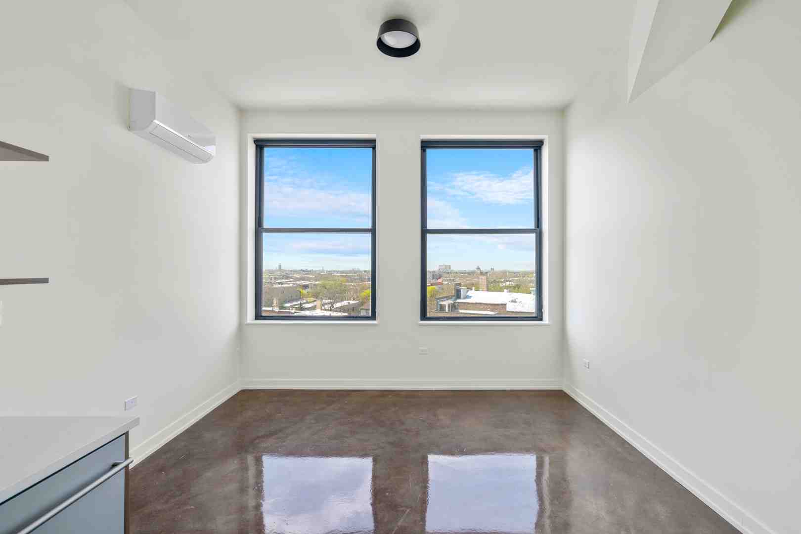 Modern apartment interior with a view - Rentals in Uptown Chicago Modern apartment interior with a view - Rentals in Uptown Chicago