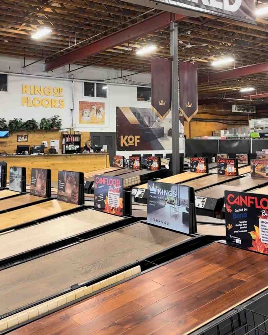 of the expansive, well-lit King of Floors showroom in Surrey, with large flooring samples on display. - flooring bc canada