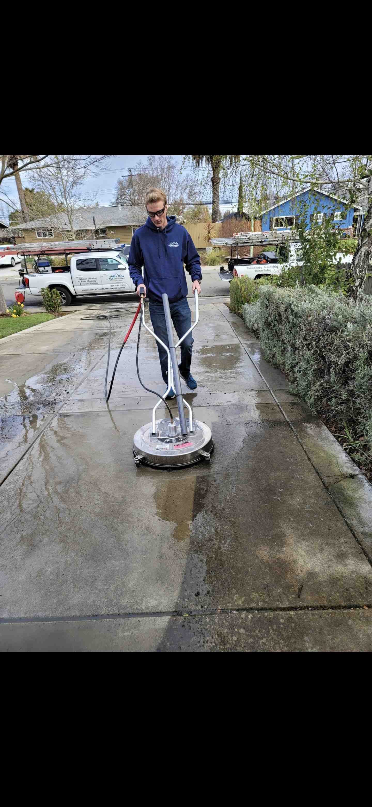 Pressure washing a driveway - exterior cleaning services