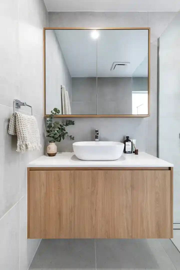 A custom-built storage solution in a compact or uniquely shaped space, demonstrating clever use of every available inch. - custom vanities and cabinets